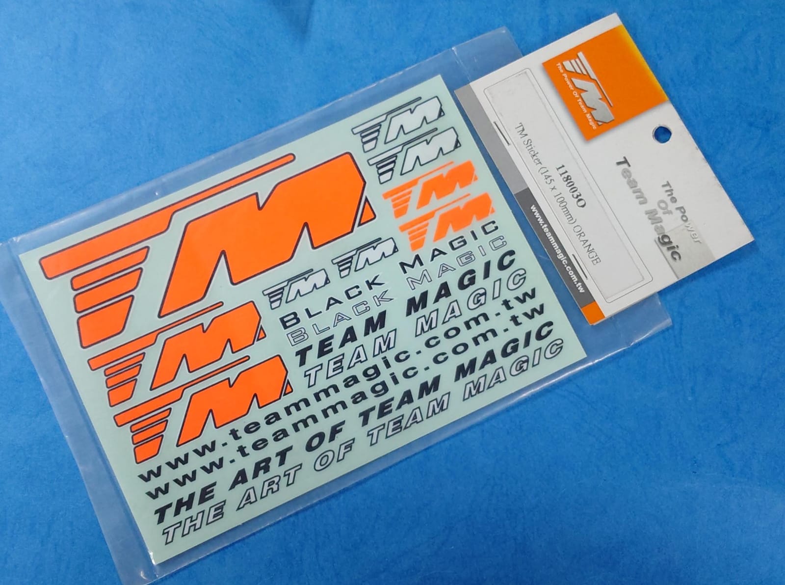 Team Magic 118003O - TM Sticker (145 x 100mm) Orange