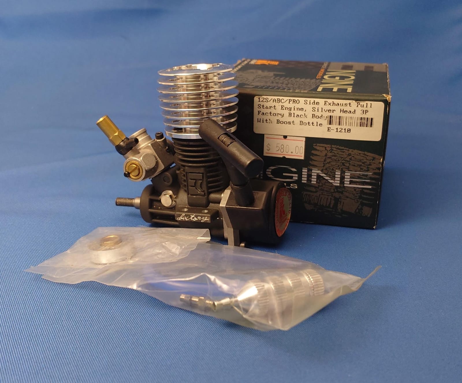 Force E-1210 - 12S/ABC/PRO Side Exhaust Pull Start Engine, Silver Head 3P Factory Black Body With Boost Bottle