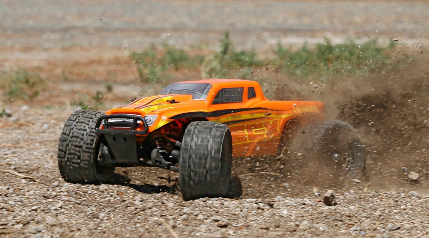 ECX ECX01000T2 - 1/18 Ruckus 4WD Monster Truck RTR, Orange/Yellow