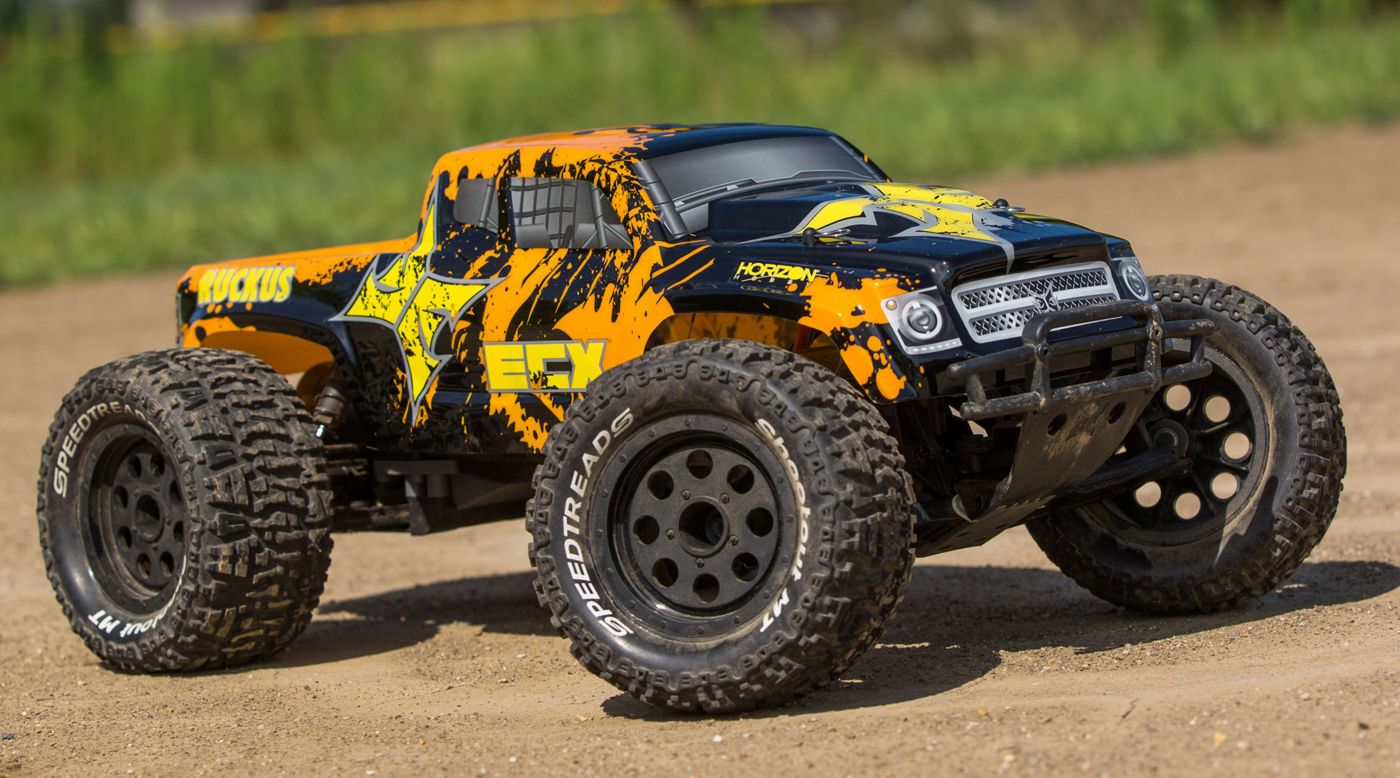ECX 03331T2 - 1/10 Ruckus 2WD Monster Truck, Brushed, LiPo RTR: Black/Orange
