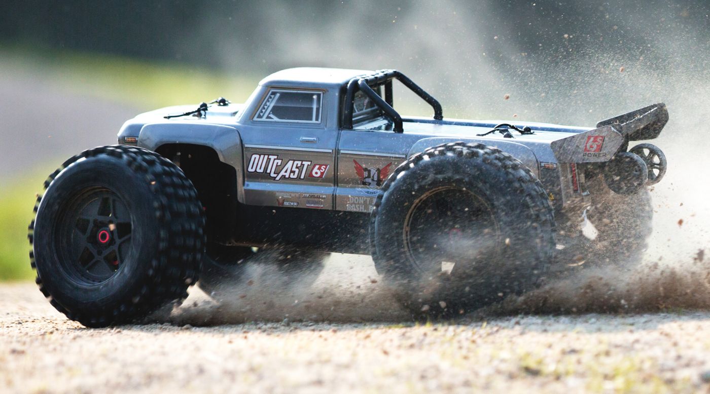 Arrma ARA106042T1 - 1/8 OUTCAST 6S BLX 4WD Brushless Stunt Truck with Spektrum RTR, Silver