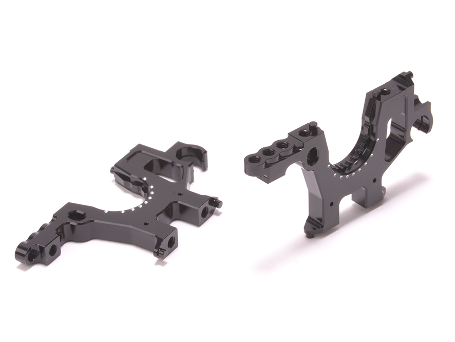 Schumacher U8729 - Alloy Trans Housing High (Option +2mm) (Mi9)